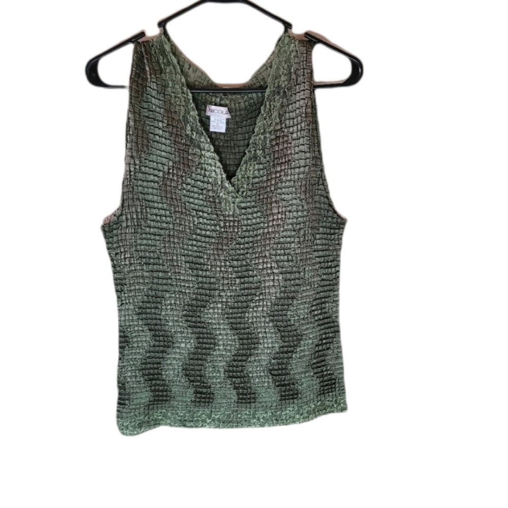 Nicola green sleeveless blouse.
